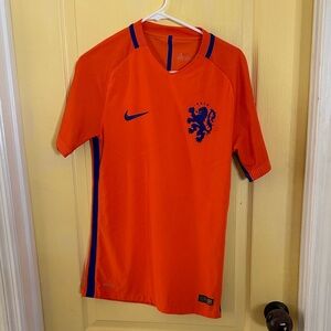 Nike Orange Football Jersey with Blue Crest